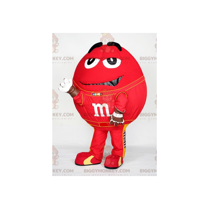 Giant Red M&M:n BIGGYMONKEY™ maskottiasu. Chocolate Candy Giant Red M&M:n BIGGYMONKEY™ maskottiasu. Chocolate Candy