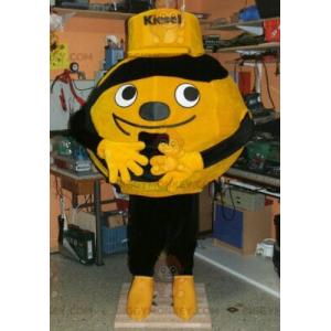 Kostým maskota se žlutým nebo oranžovým a černým balónkem