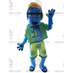 Sinisen koiran BIGGYMONKEY™ maskottiasu lomaasussa. Kesäinen