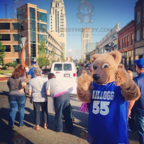 BIGGYMONKEY™ mascot costume of beige bear with a blue jersey -