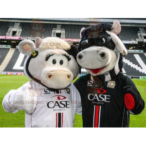 2 BIGGYMONKEY™s mascot cows, one white and one black -