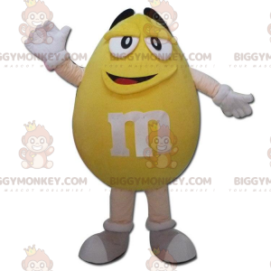 Giant Yellow M&M's BIGGYMONKEY™ μασκότ στολή, στολή σοκολάτας καραμέλας - Μασκότ διάσημων χαρακτήρων - BiggyMonkey.com