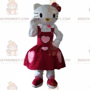 Hello Kitty BIGGYMONKEY™ maskotkostume klædt i en smuk kjole med hjerter - Masker berømte mennesker - BiggyMonkey.com