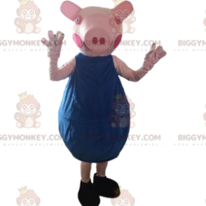 Pinkes Schweinekostüm mit blauem Outfit - Biggymonkey.com