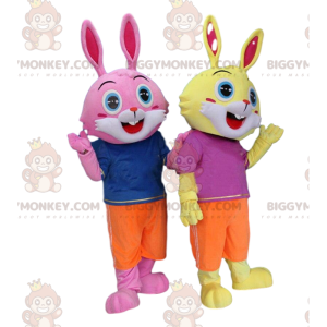 2 costumes de lapins, un jaune et un rose, avec des yeux bleus