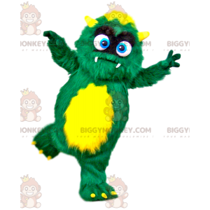 Kostým malého zeleného a žlutého chlupatého monstra