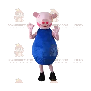 Zeug mascotte met een blauwe jurk. zaaien kostuum -