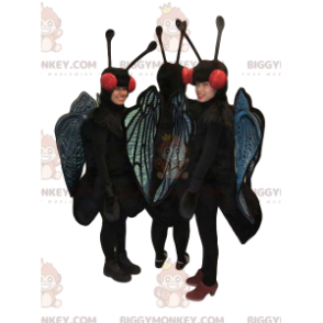 La mascota de BIGGYMONKEY™ de tres mariposas negras y azules.