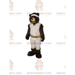 Karhun BIGGYMONKEY™ maskottiasu valkoisessa urheiluasussa.