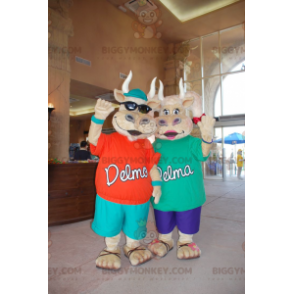 2 mascotte della mucca beige di BIGGYMONKEY™ in abiti colorati