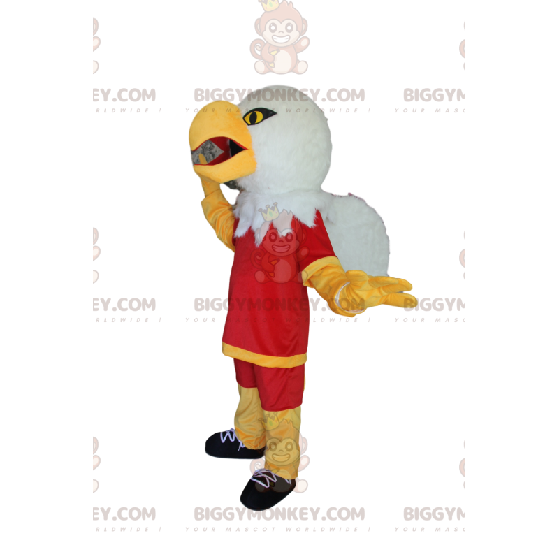 Golden Eagle BIGGYMONKEY™ maskottiasu punaisella urheiluasulla Golden Eagle BIGGYMONKEY™ maskottiasu punaisella urheiluasulla
