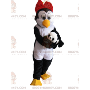 Costume de mascotte BIGGYMONKEY™ de pingouine avec un nœud papiloon rouge et une peluche - Mascottes Poisson - BiggyMonkey.com