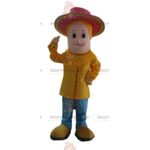 Dreng BIGGYMONKEY™ maskotkostume klædt i gult med lyserød hat -