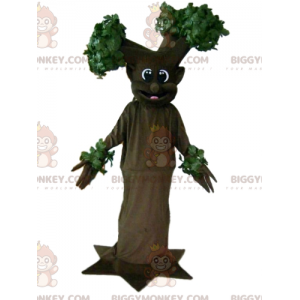 Costume da mascotte gigante sorridente marrone e albero verde