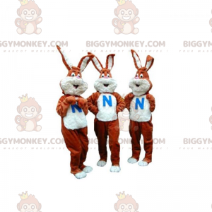3 mascote BIGGYMONKEY™ de coelhos marrons e brancos. Conjunto