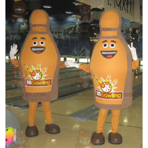 2 Mascotte sorridente dei birilli da bowling marroni di