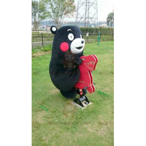 Mustavalkoinen karhu punaposkilla BIGGYMONKEY™ maskottiasu -