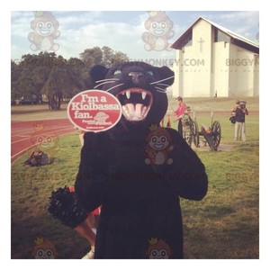 BiggyMonkey mascot: Black panther mascot. Discover @biggymonkey_mascots #mascots - Link : https://bit.ly/3linbWk - BIGGYMONKEY_0457 #mascots #mascot #event #costume #biggymonkey #marketing #customized #black #costume #panther #custom https://www.biggymonkey.com/en/lion-mascots/457-black-panther-mascot.html